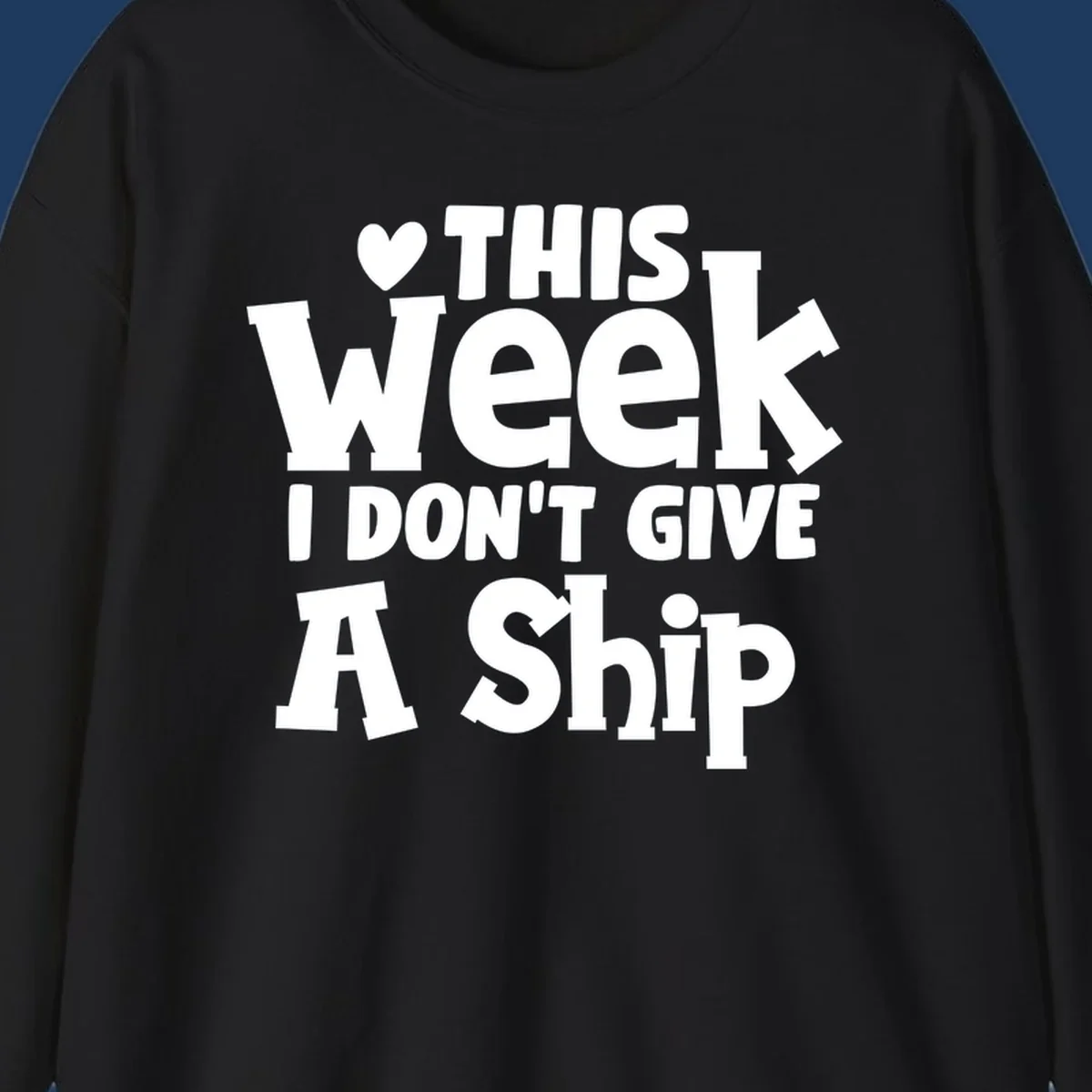 Bold white text reading 'Love This Week I Don't Give A Ship' with heart and arrow symbols on gray background