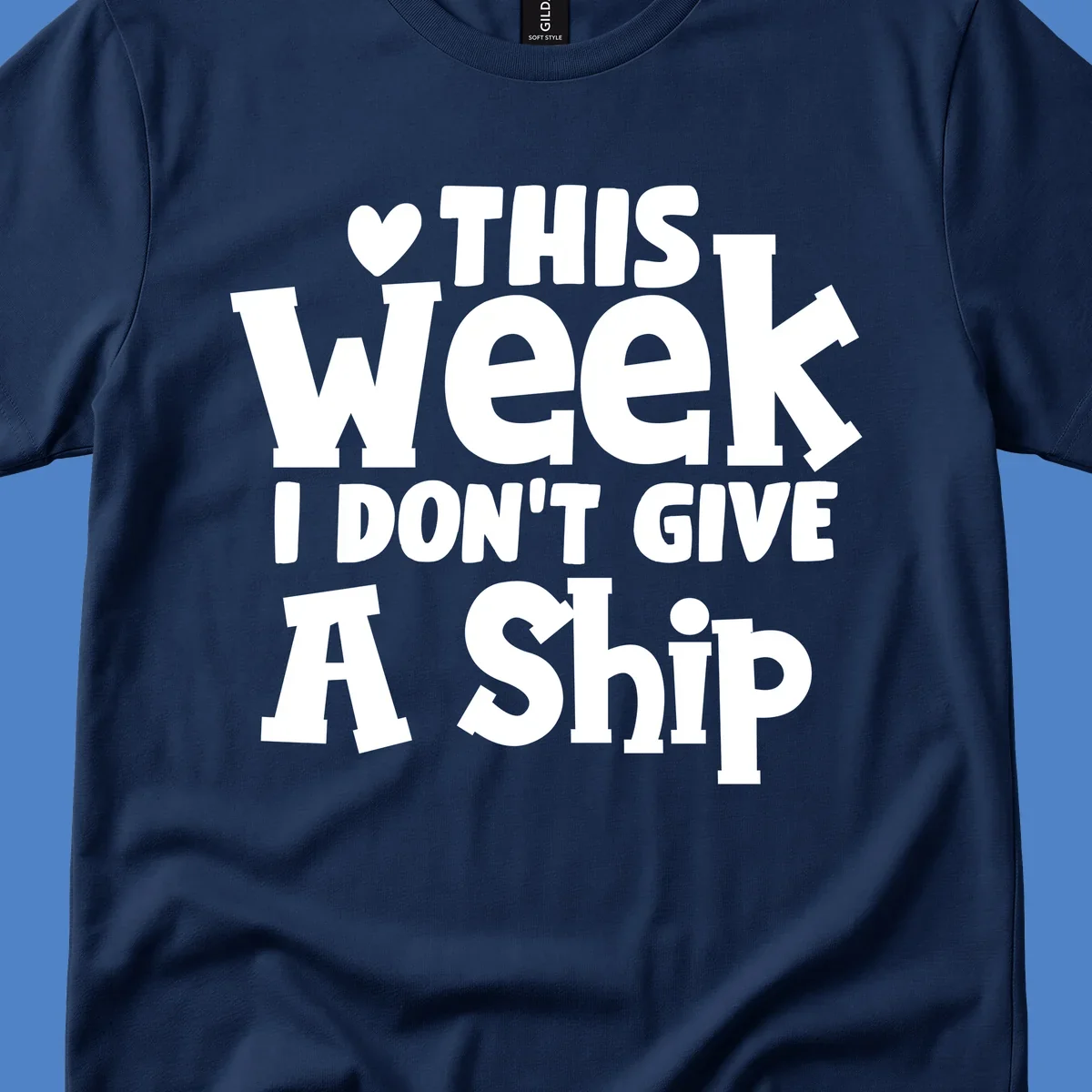 Bold white text reading 'Love This Week I Don't Give A Ship' with heart and arrow symbols on gray background