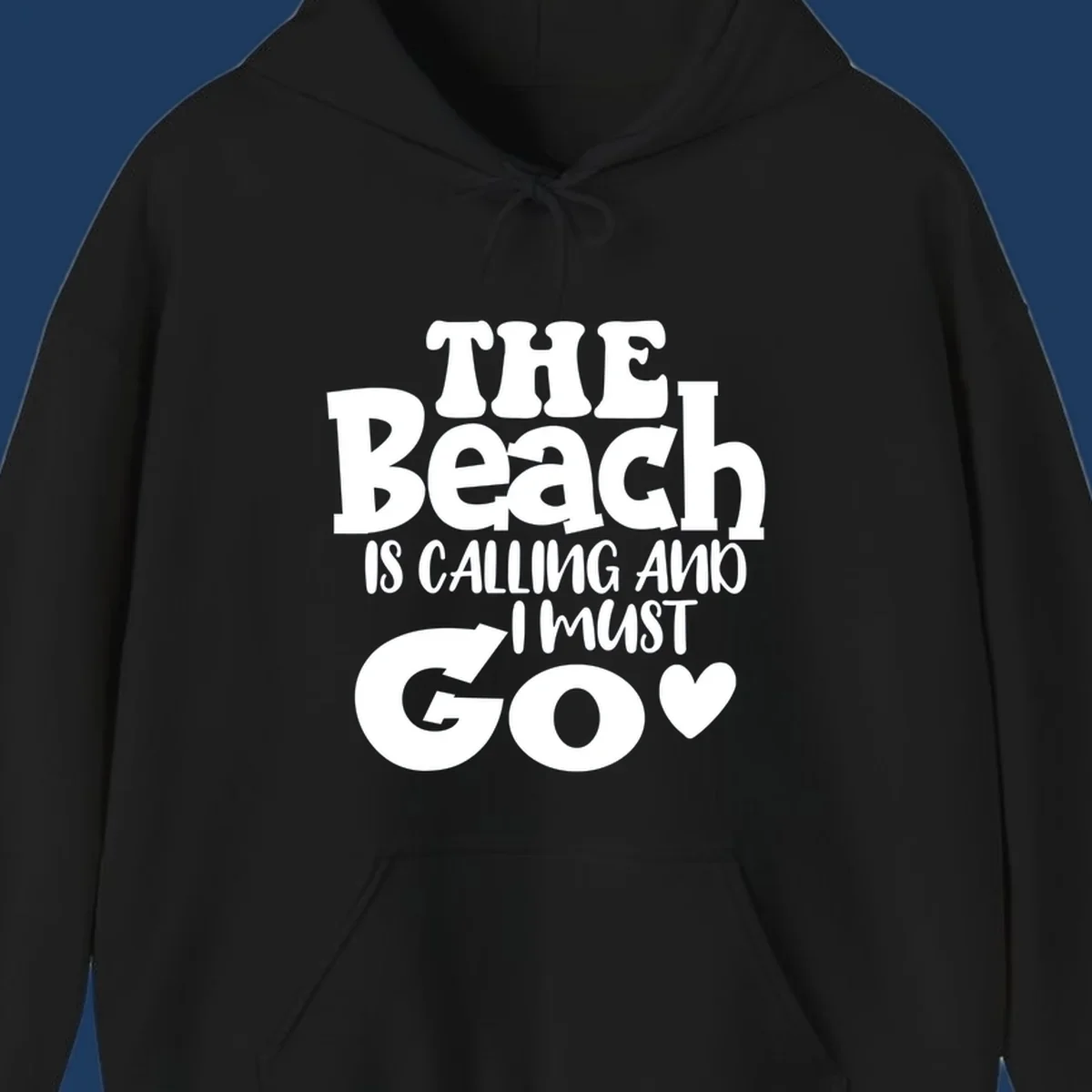 Beach is calling and I must go typography design with heart symbol, white text on gray background