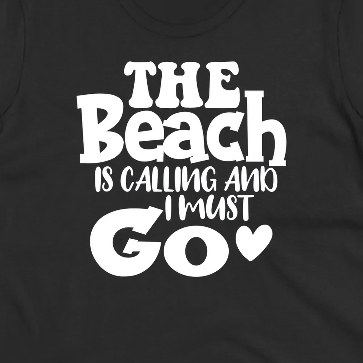 Beach is calling and I must go typography design with heart symbol, white text on gray background