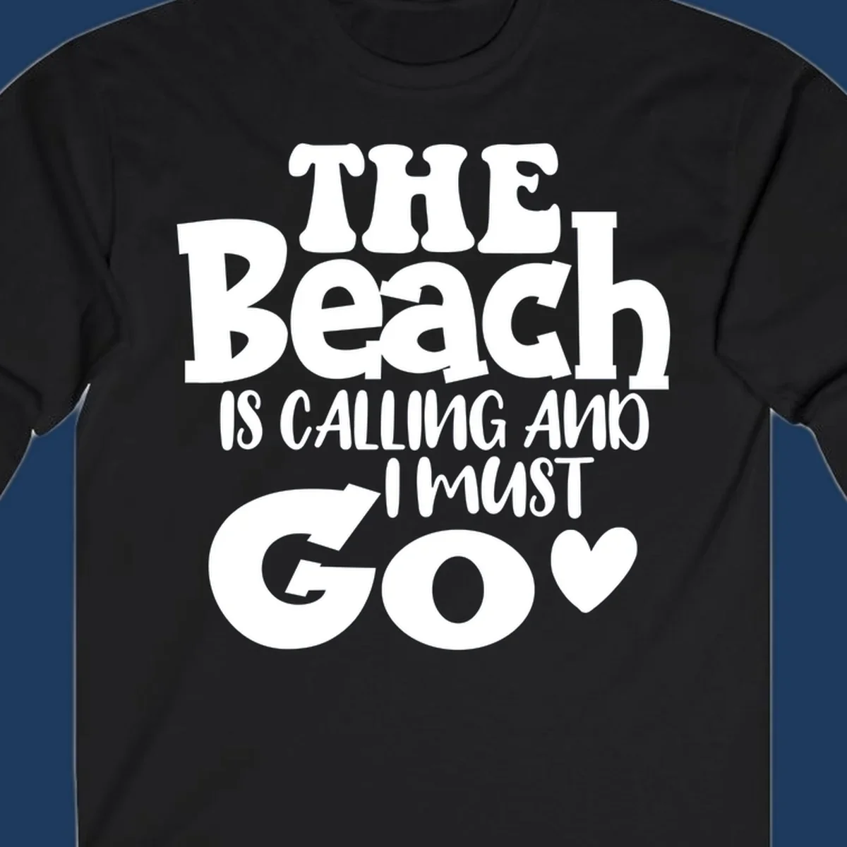 Beach is calling and I must go typography design with heart symbol, white text on gray background