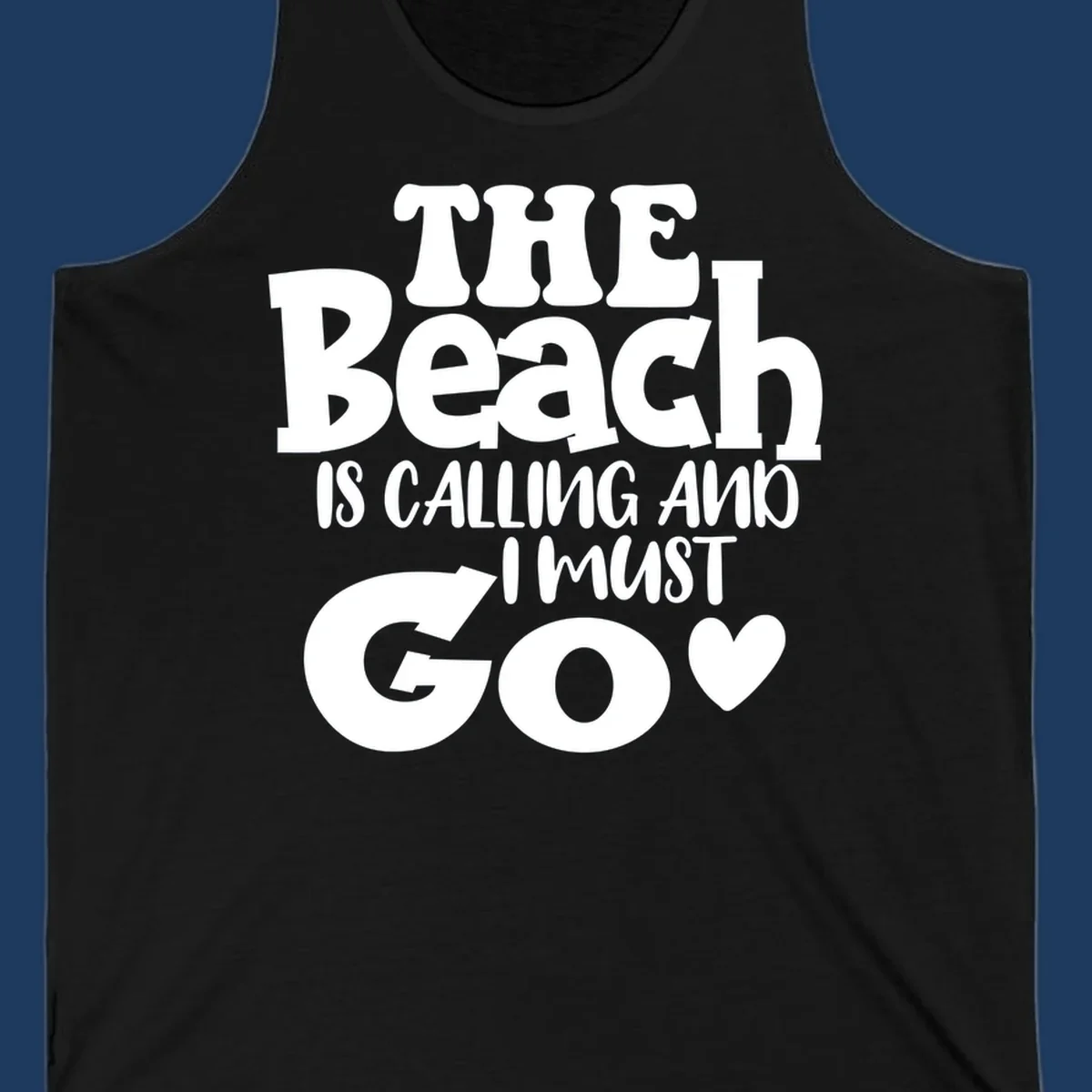 Beach is calling and I must go typography design with heart symbol, white text on gray background