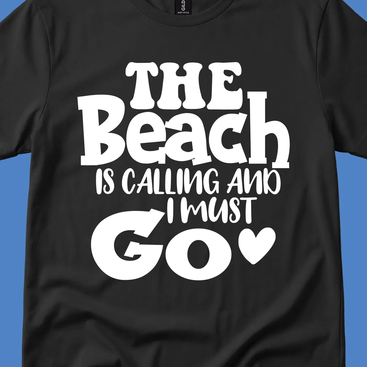 Beach is calling and I must go typography design with heart symbol, white text on gray background