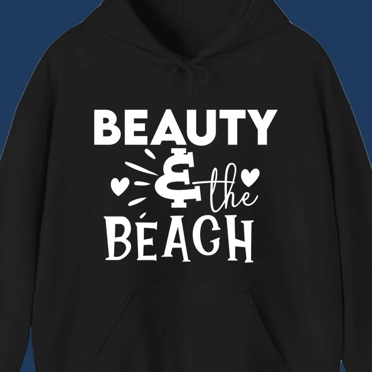 White text design reading 'Beauty & The Beach' with dollar sign symbol and heart decorations on gray background