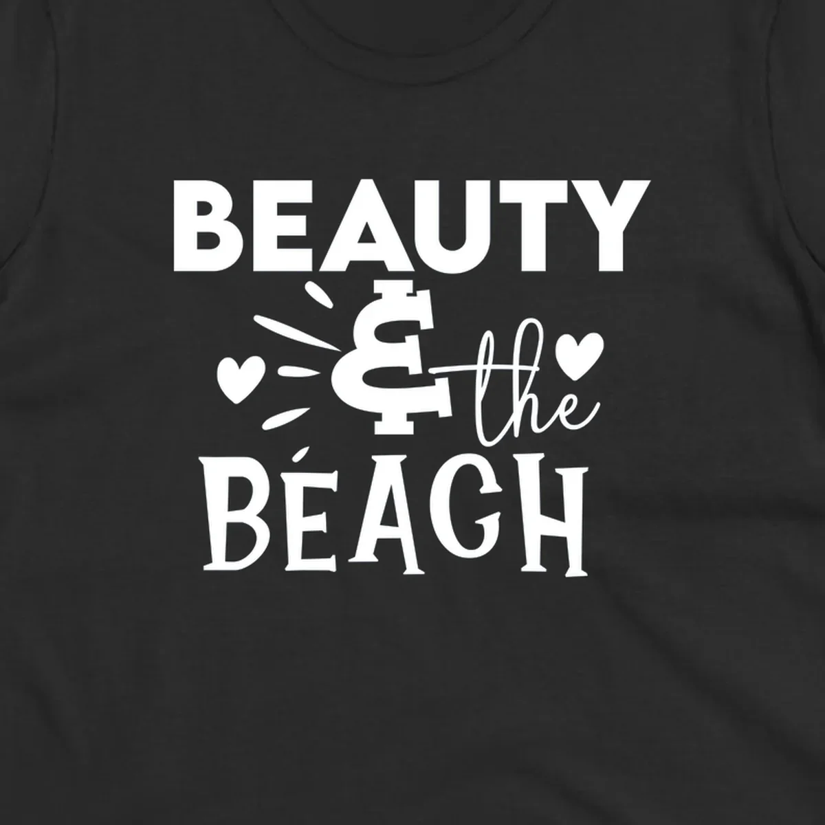 White text design reading 'Beauty & The Beach' with dollar sign symbol and heart decorations on gray background