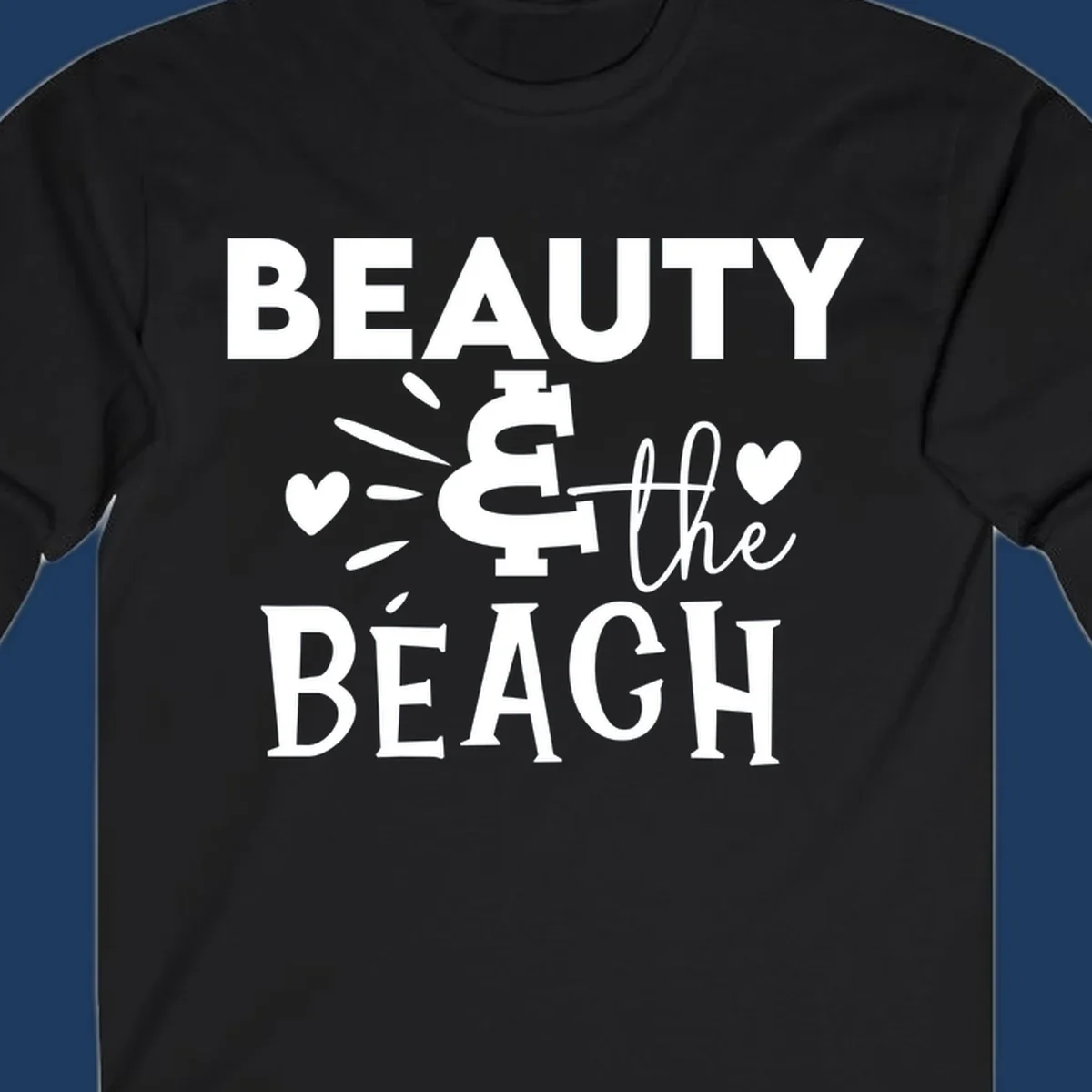 White text design reading 'Beauty & The Beach' with dollar sign symbol and heart decorations on gray background