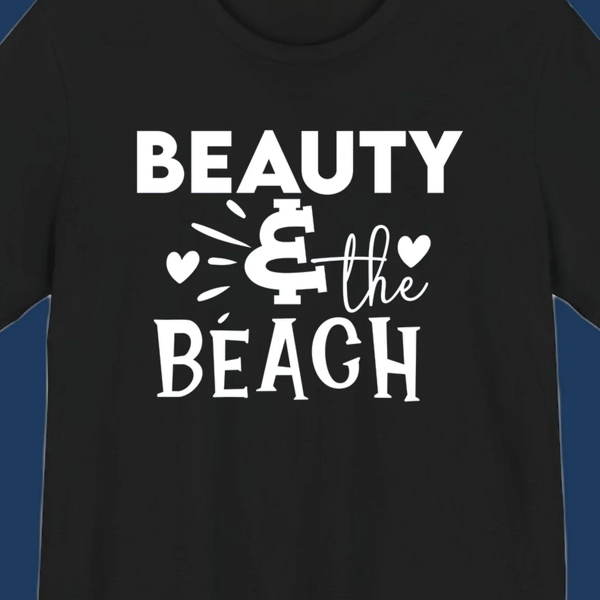 White text design reading 'Beauty & The Beach' with dollar sign symbol and heart decorations on gray background