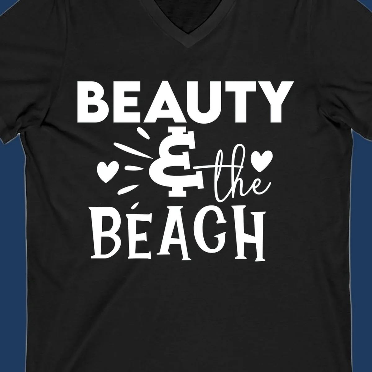 White text design reading 'Beauty & The Beach' with dollar sign symbol and heart decorations on gray background