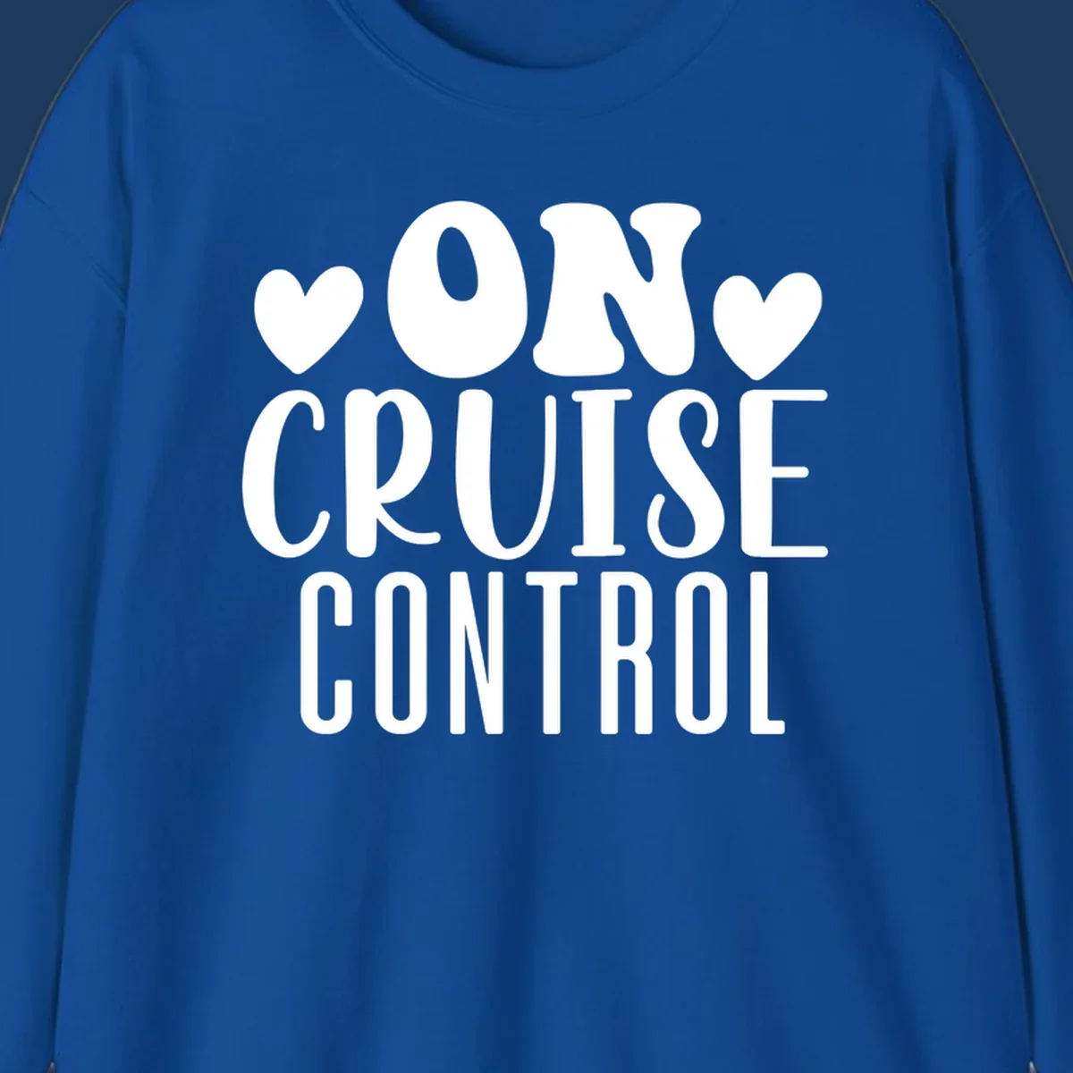 White text reading 'ON CRUISE CONTROL' with heart decorations on gray background, playful cruise vacation design