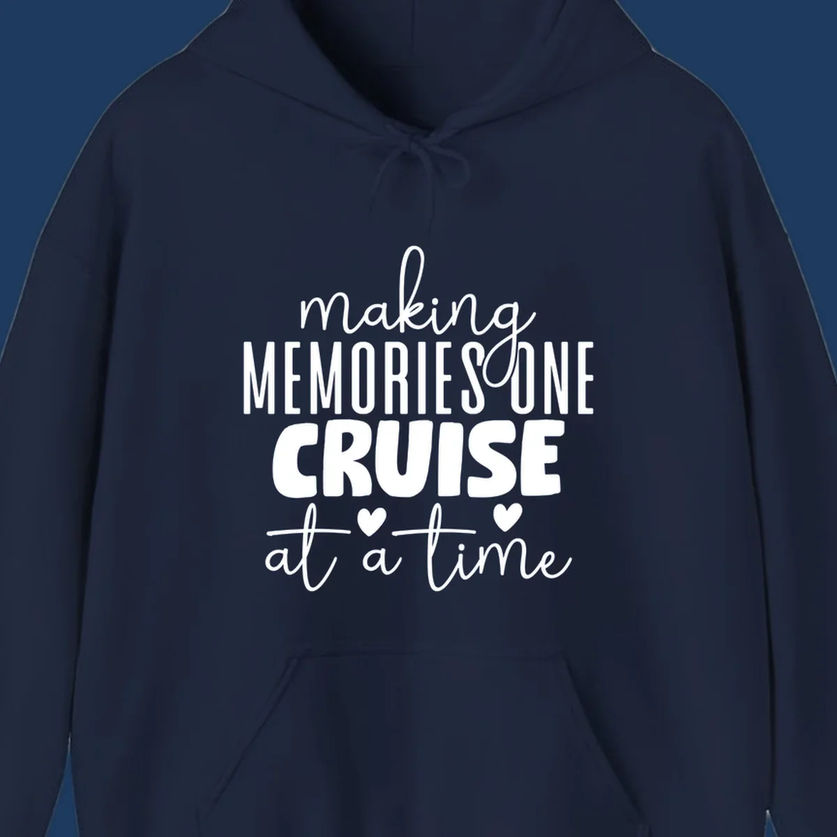 White text on gray background reading 'Making Memories One Cruise At A Time' with decorative hearts and flourishes for cruise vacation apparel
