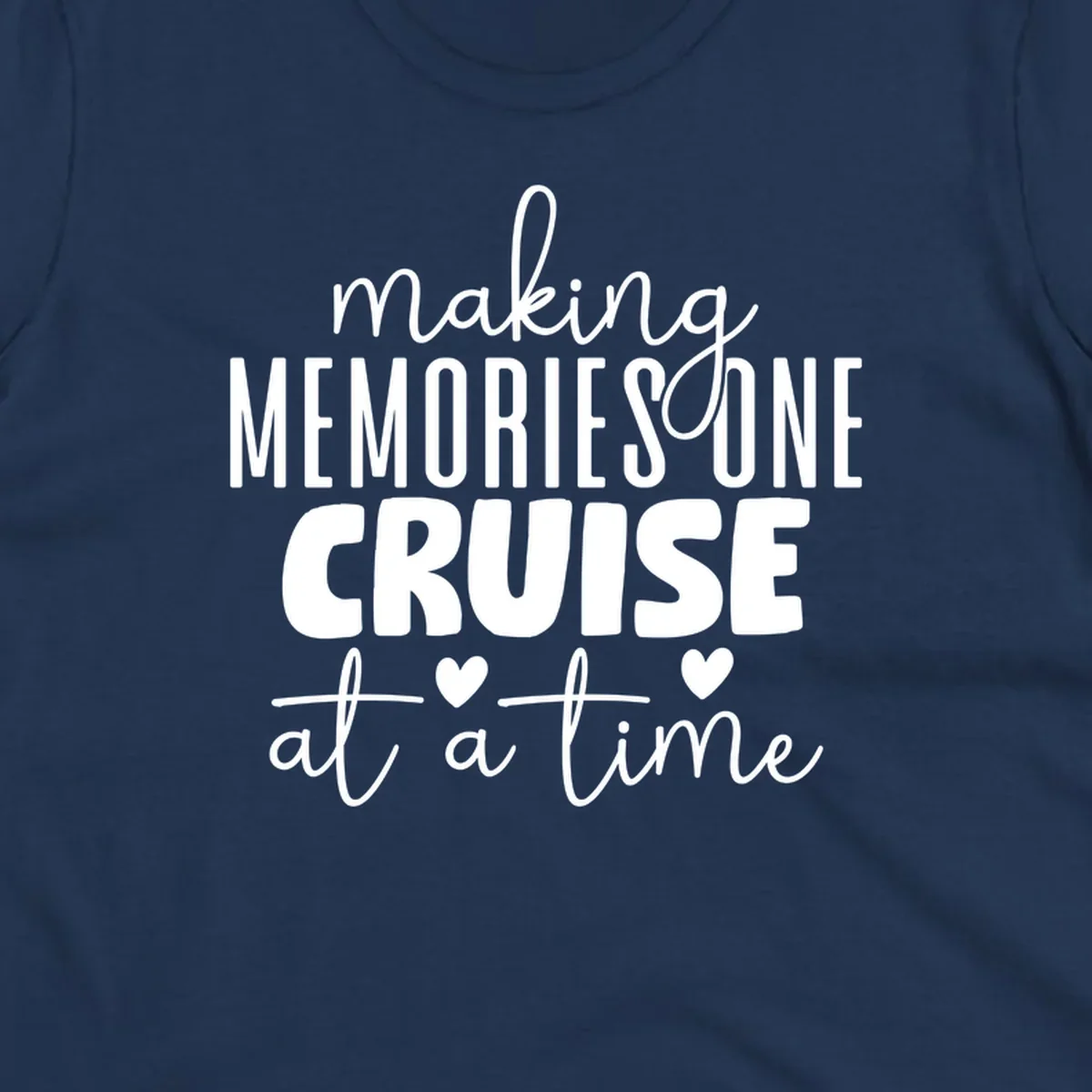White text on gray background reading 'Making Memories One Cruise At A Time' with decorative hearts and flourishes for cruise vacation apparel