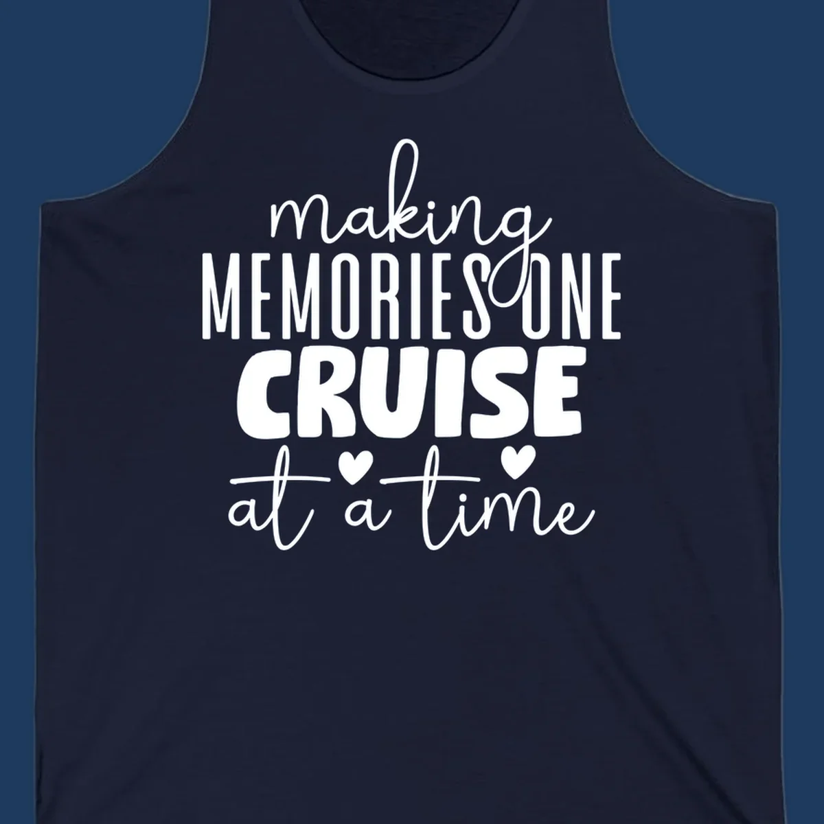 White text on gray background reading 'Making Memories One Cruise At A Time' with decorative hearts and flourishes for cruise vacation apparel