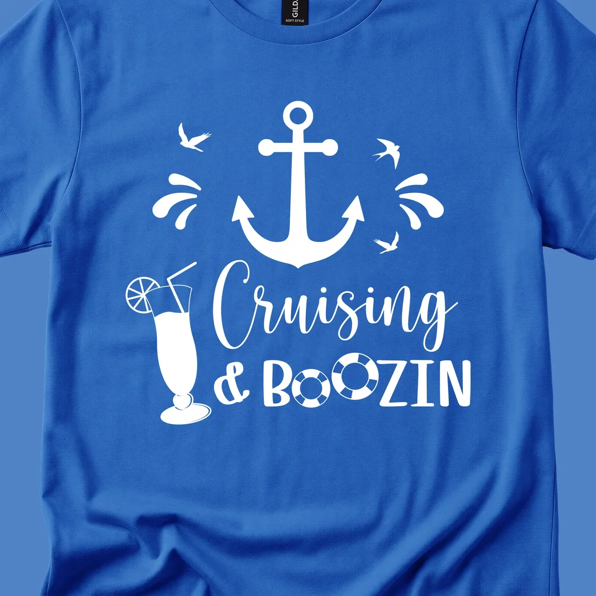 Cruising and boozin anchor design with nautical elements, cocktail, and seabirds on gray background