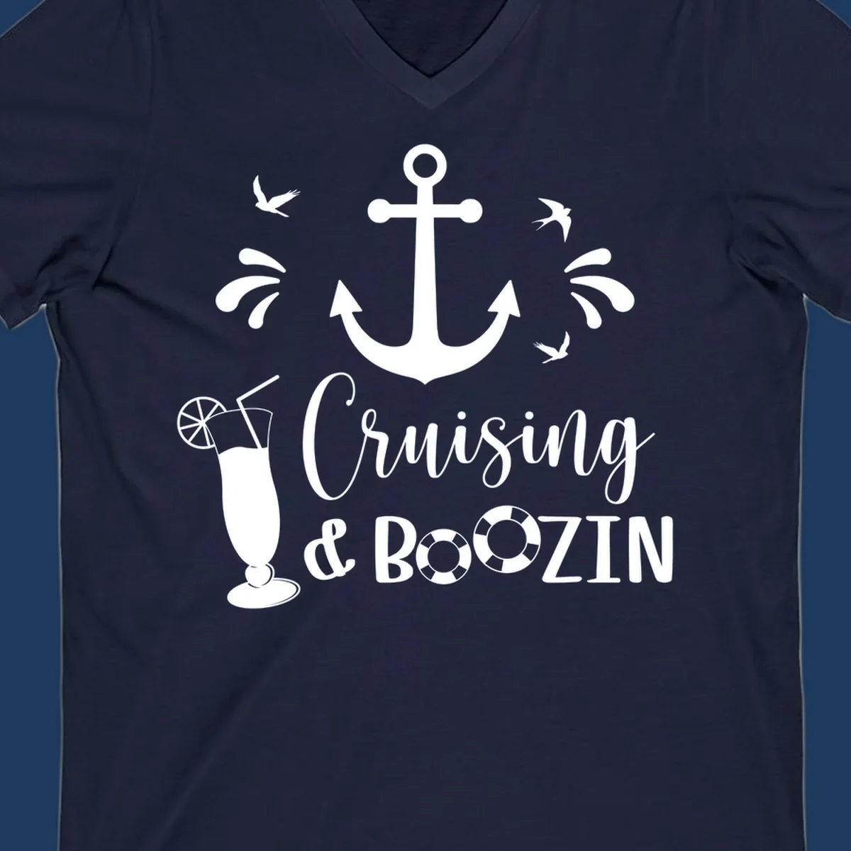 Cruising and boozin anchor design with nautical elements, cocktail, and seabirds on gray background