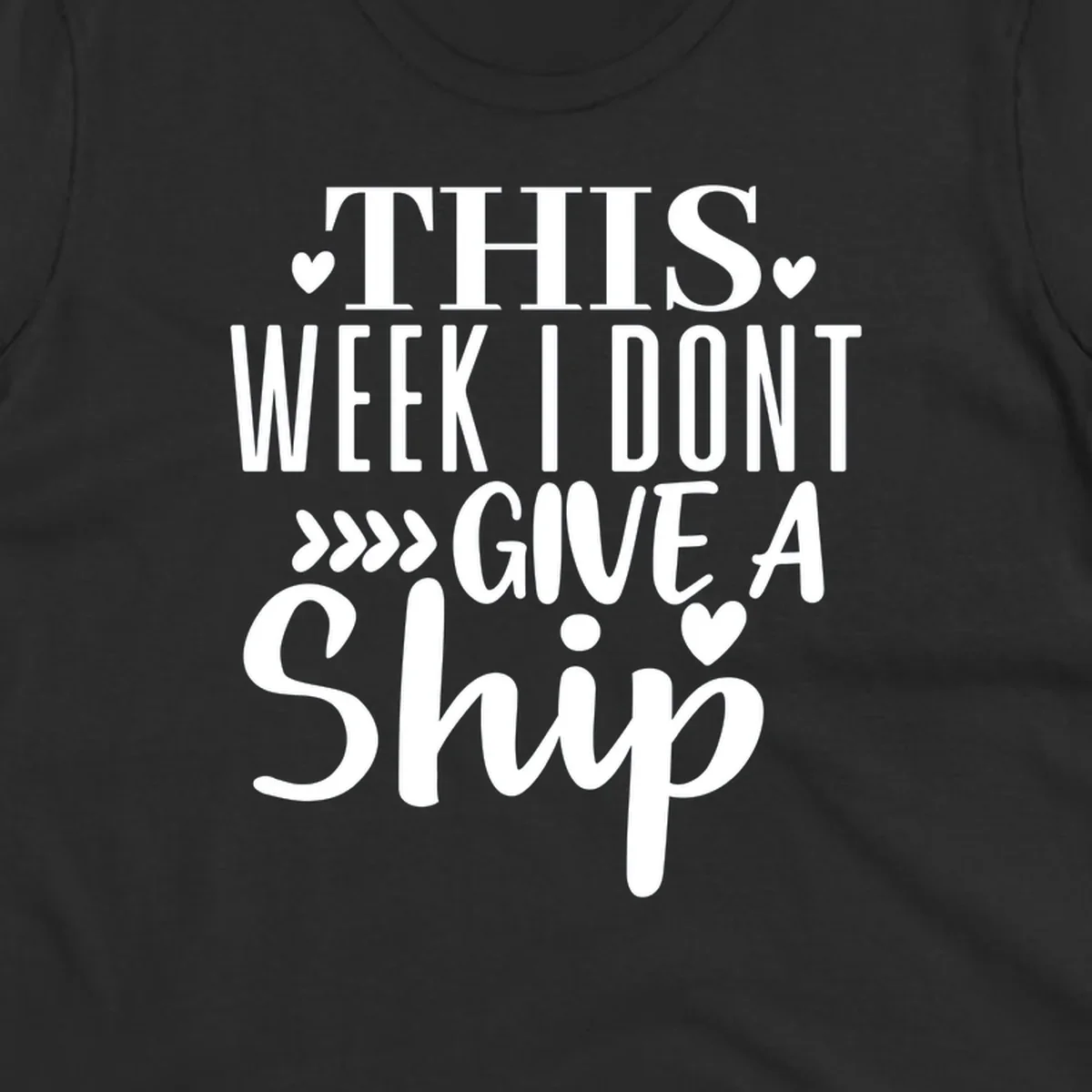 White text on gray background reading 'This Week I Don't Give A Ship' with hearts and arrows, a playful cruise humor design
