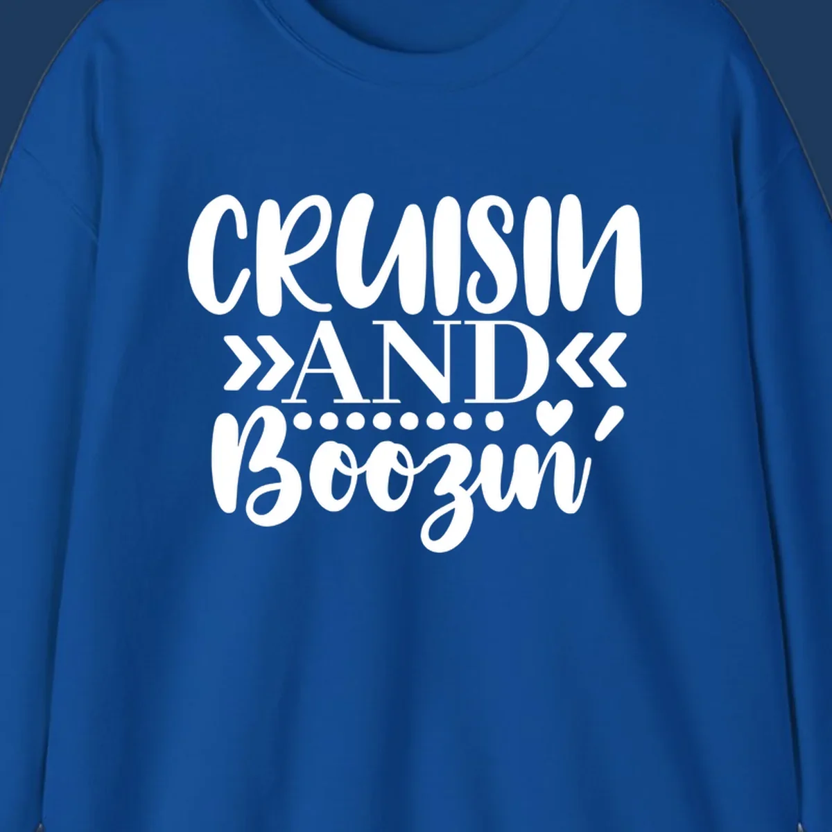 White text on gray background reading 'CRUISIN' AND BOOZING' with decorative chevron arrows and heart symbol