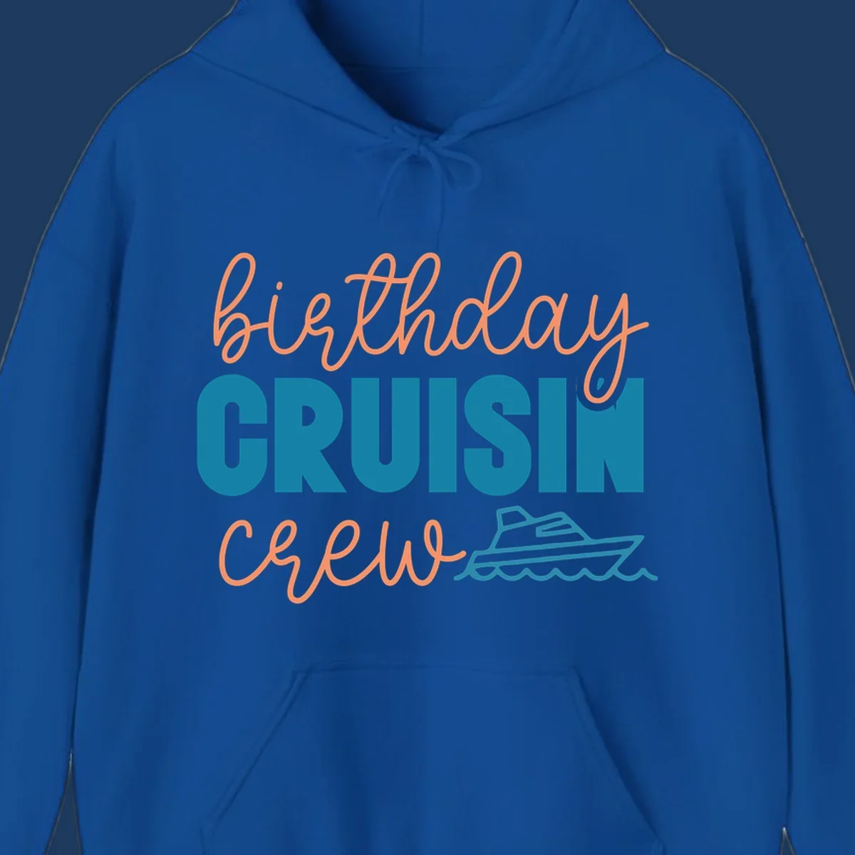 Birthday crushin crew design with coral script text, teal ship illustration, and ocean waves on gray background