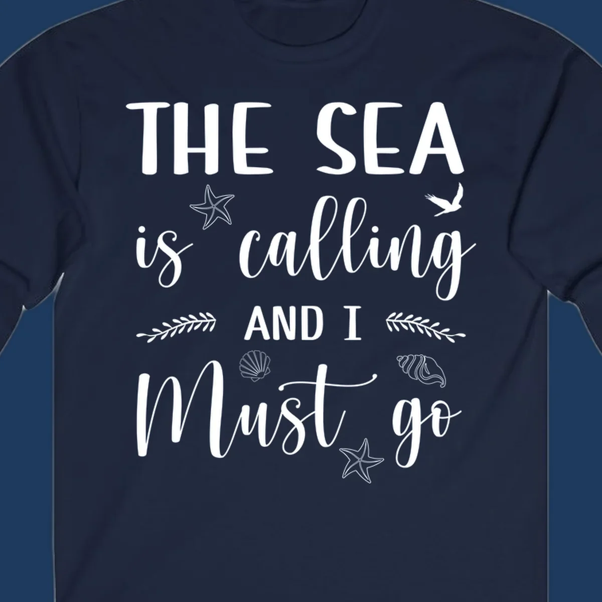 Gray design with white text reading 'The Sea is calling AND I MUST go' surrounded by starfish, seashells, a flying bird, and leaf accents