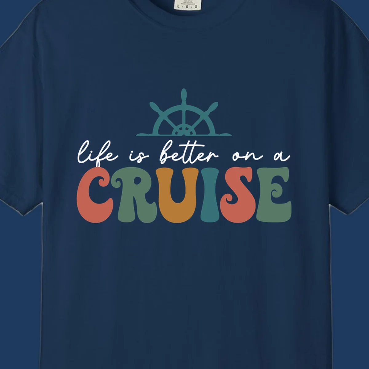 Life is better on a cruise design with ship's wheel and colorful text on gray background