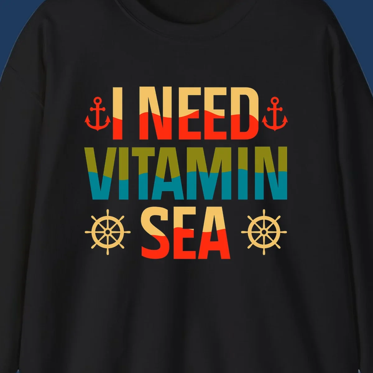 Colorful nautical design with anchors, ship wheels, and text reading 'I NEED VITAMIN SEA' for cruise lovers