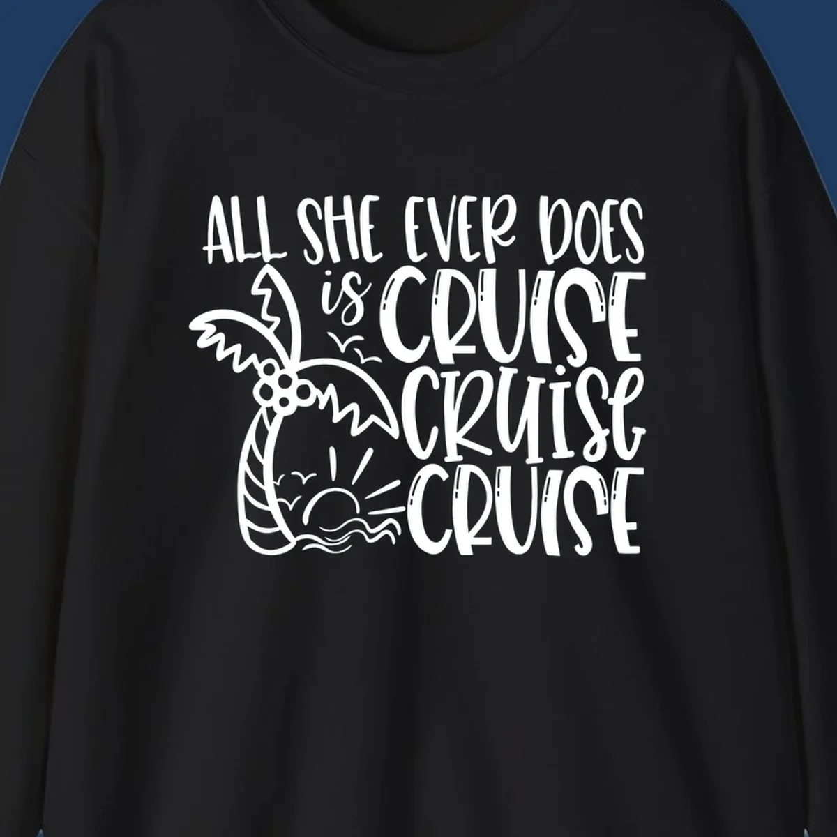 White hand-lettered text reading 'All She Ever Does Is Cruise Cruise Cruise' with tropical leaf and wave illustrations on gray background