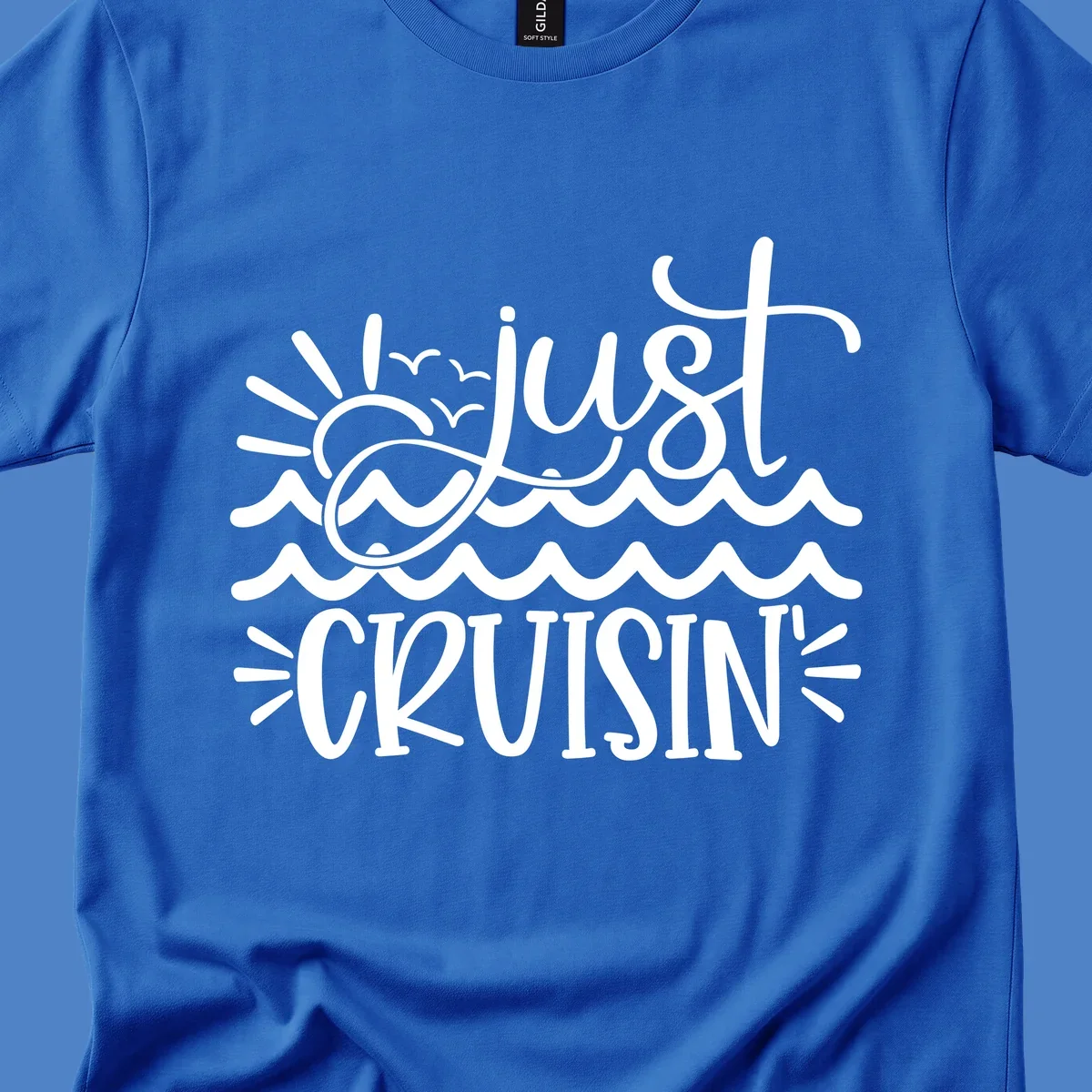White line-art illustration of sun and ocean waves with 'just CRUISIN'' text on gray background
