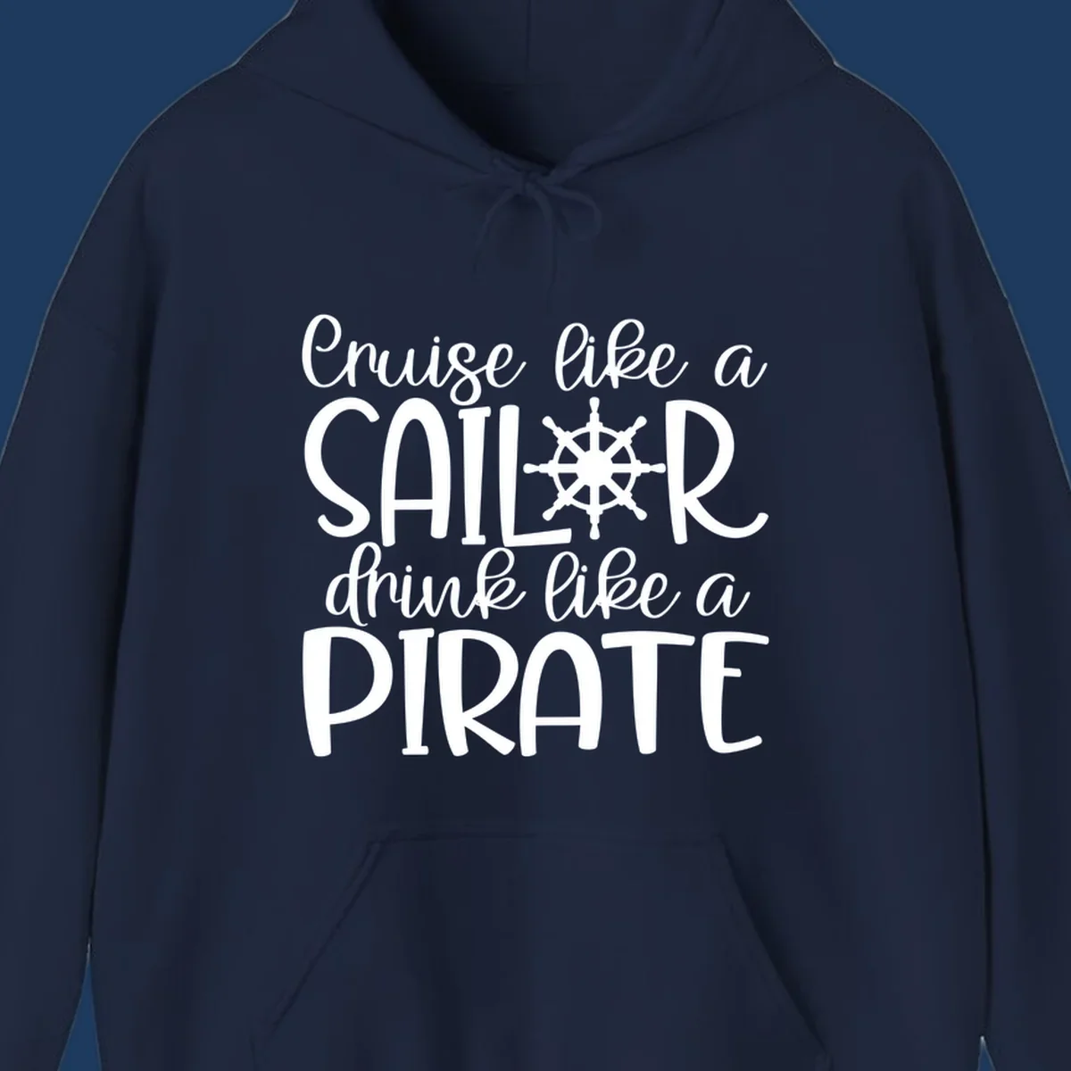 White text design with ship wheel graphic reading 'Cruise like a SAILOR drink like a PIRATE' on gray background