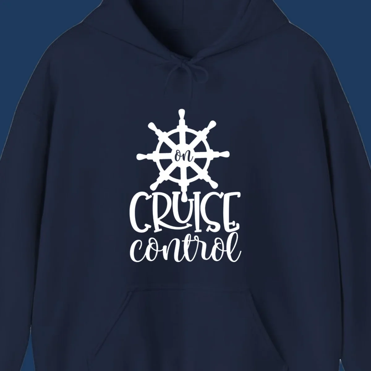 White ship wheel with 'ON CRUISE CONTROL' text below on gray background - nautical cruise design
