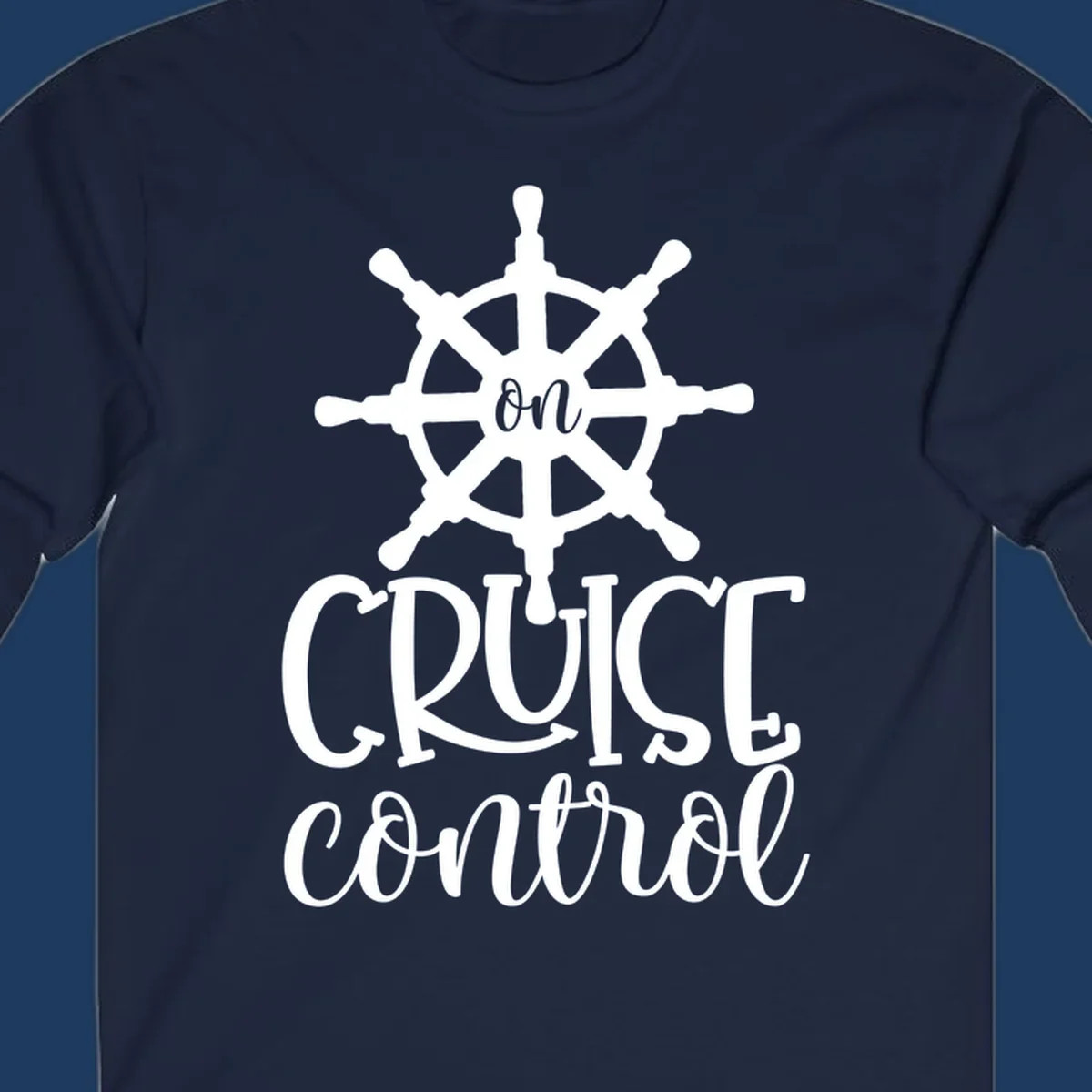 White ship wheel with 'ON CRUISE CONTROL' text below on gray background - nautical cruise design