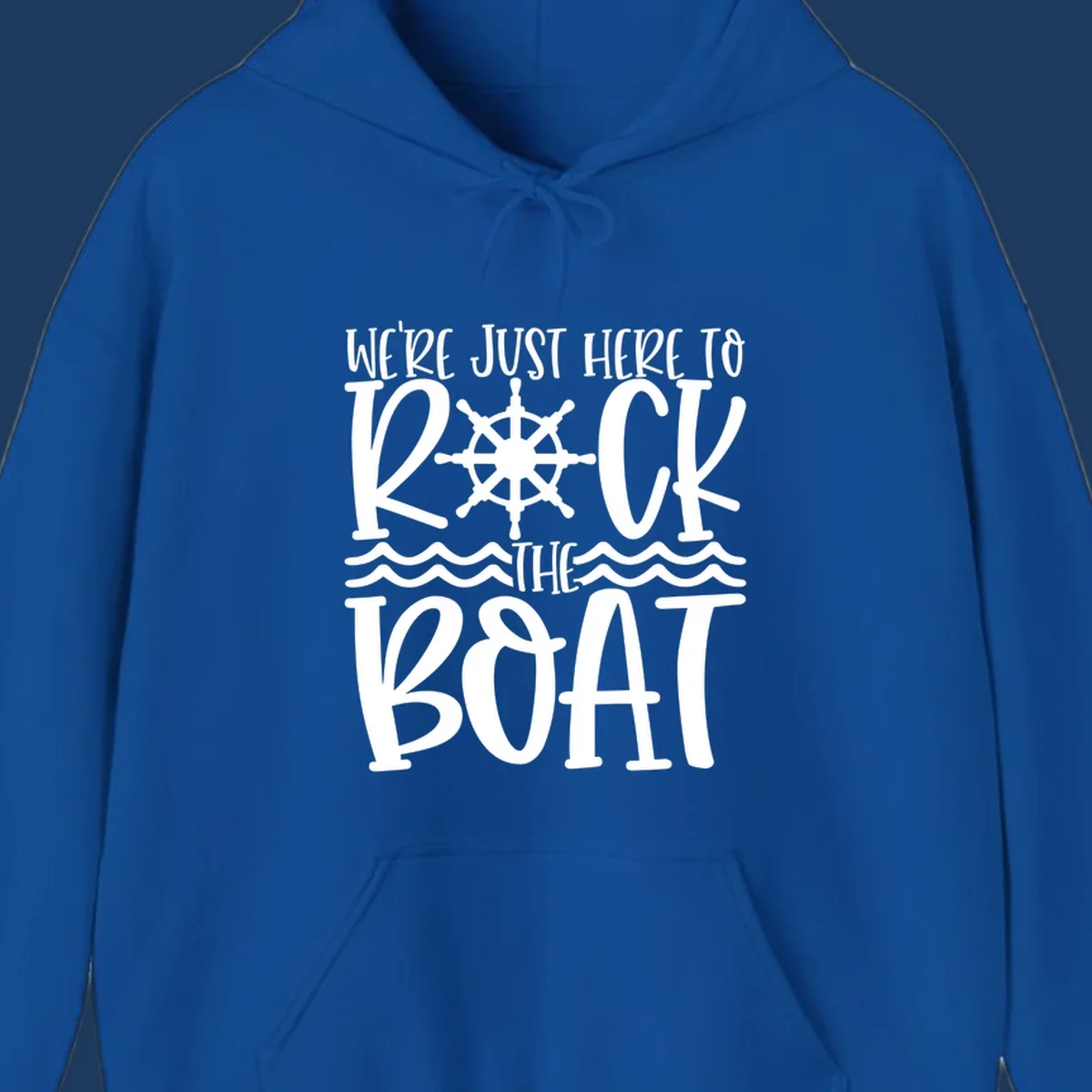 White nautical design with ship's wheel and ocean waves featuring text 'We're Just Here To Kick The Boat' on gray background