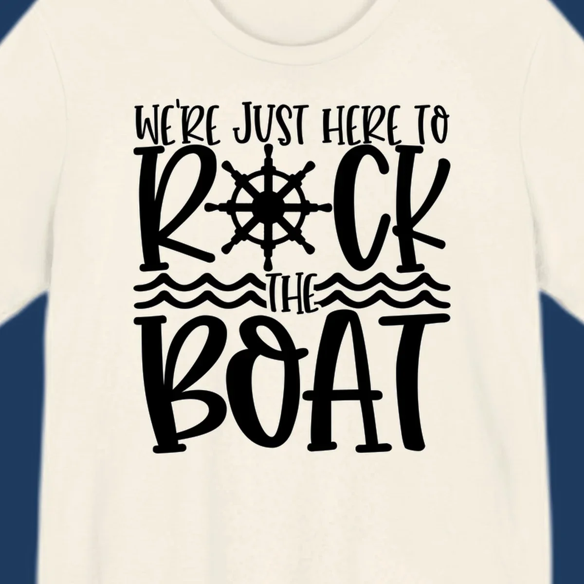 White nautical design with ship's wheel and ocean waves featuring text 'We're Just Here To Kick The Boat' on gray background