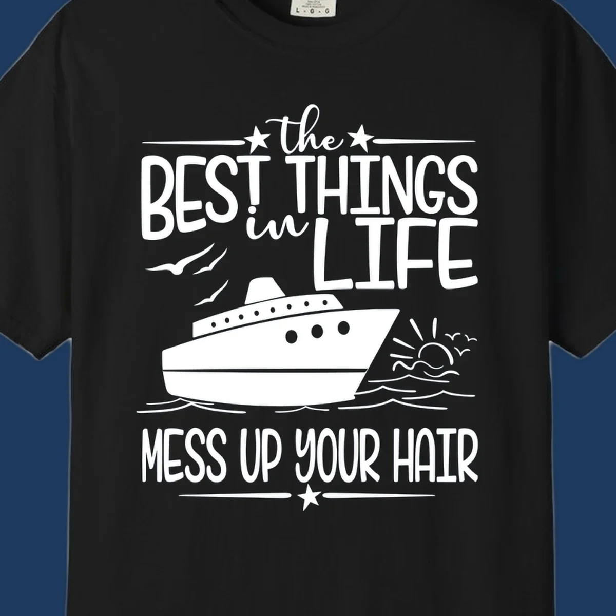 Cruise ship on ocean waves with text 'The Best Things in Life Mess Up Your Hair' design for best-things-mess-up-hair vacation tees