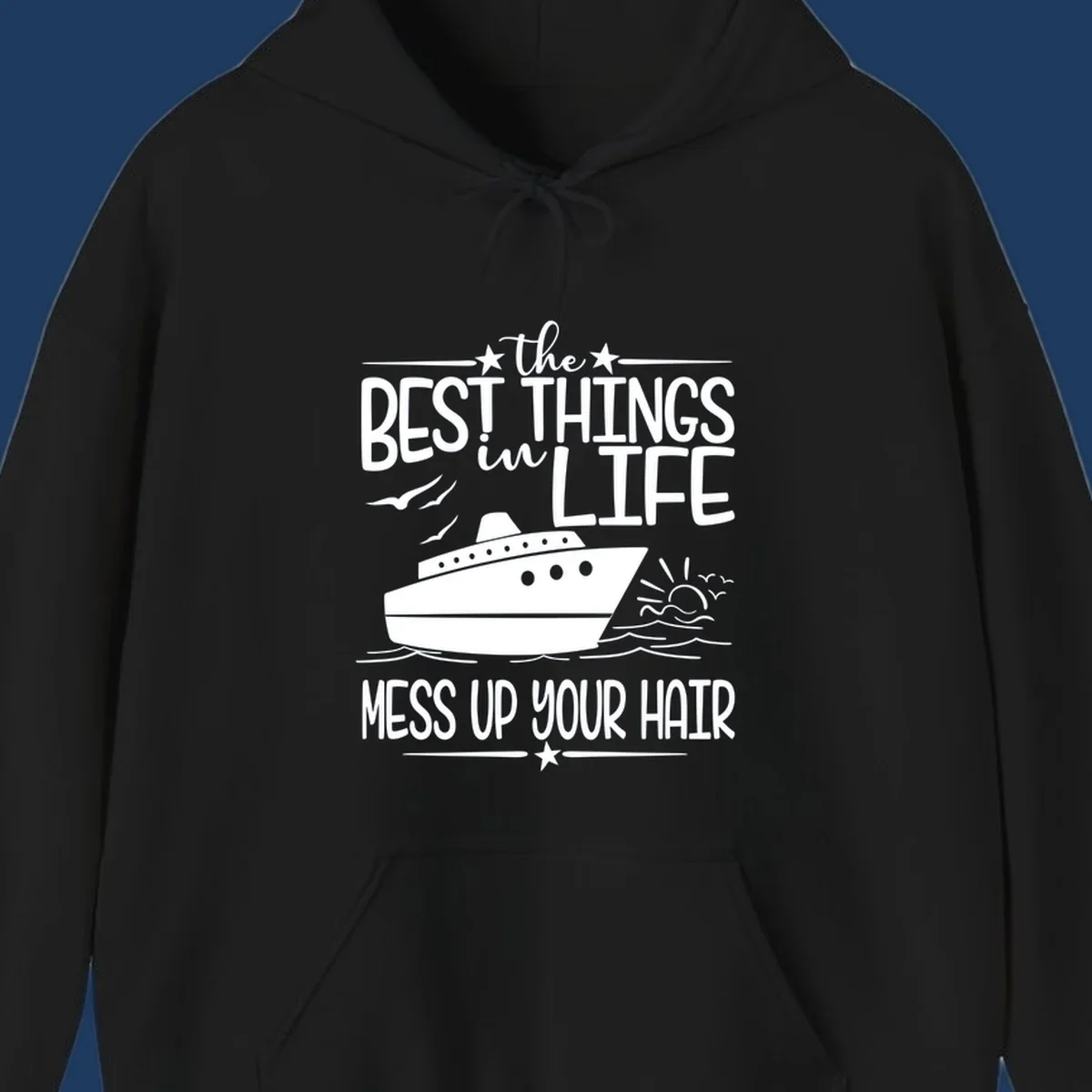 Cruise ship on ocean waves with text 'The Best Things in Life Mess Up Your Hair' design for best-things-mess-up-hair vacation tees