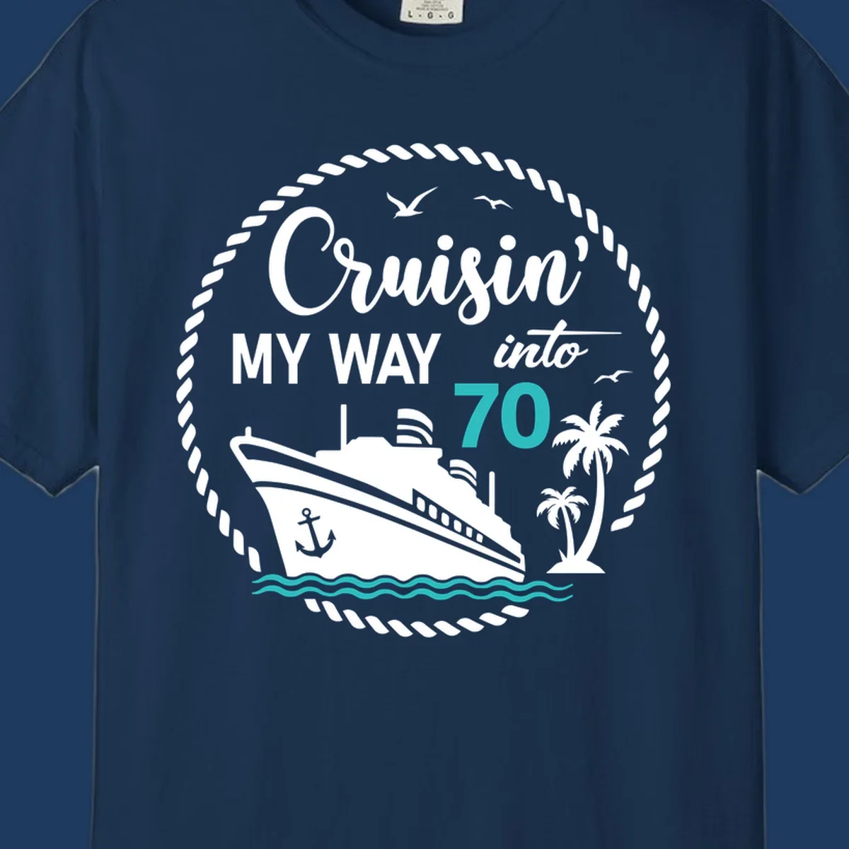 Nautical 70th birthday design with cruise ship, palm trees, and waves. Text reads 'Cruisin' MY WAY into 70' in white and teal on gray background.