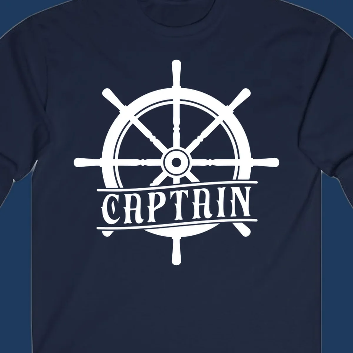 White captain ship wheel design with eight spokes and center hub, featuring the word CAPTAIN below in bold lettering with decorative lines on gray background.