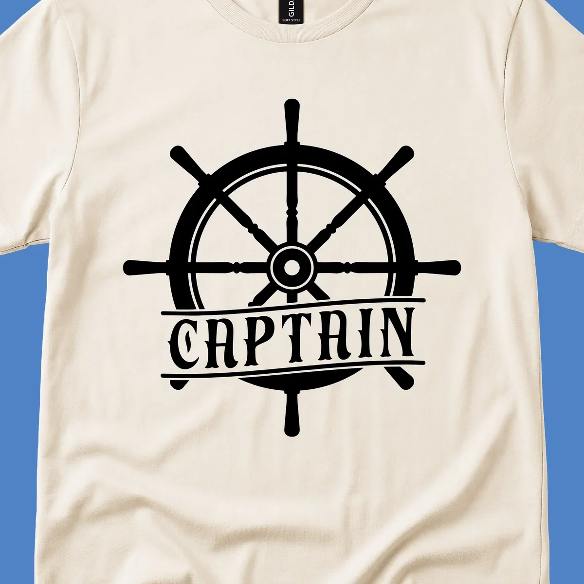 White captain ship wheel design with eight spokes and center hub, featuring the word CAPTAIN below in bold lettering with decorative lines on gray background.