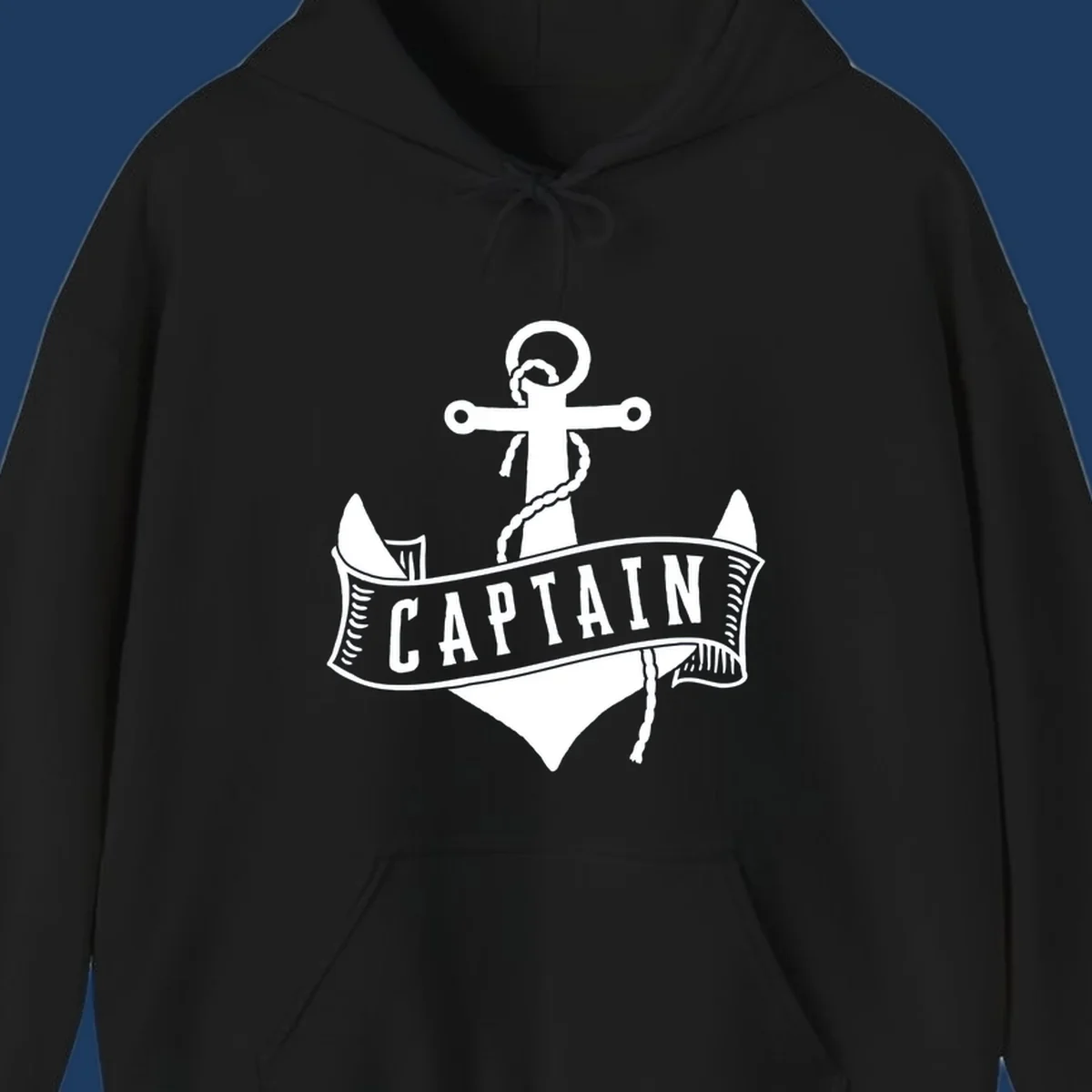 Vintage nautical captain anchor badge design with rope, cross emblem, sailing ship, and banner ribbon on gray background.