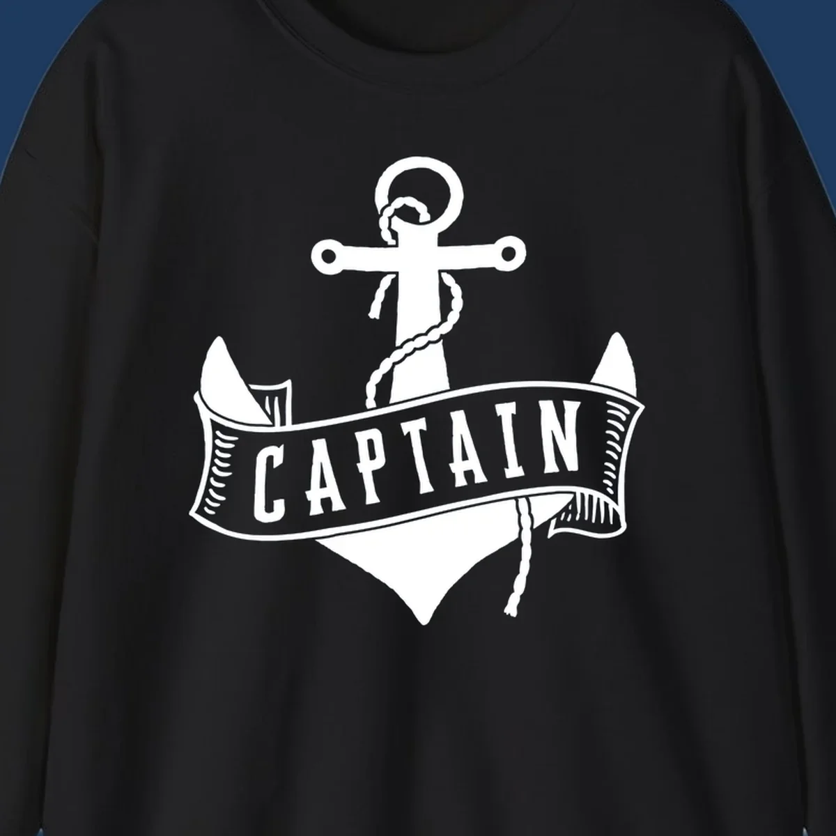 Vintage nautical captain anchor badge design with rope, cross emblem, sailing ship, and banner ribbon on gray background.