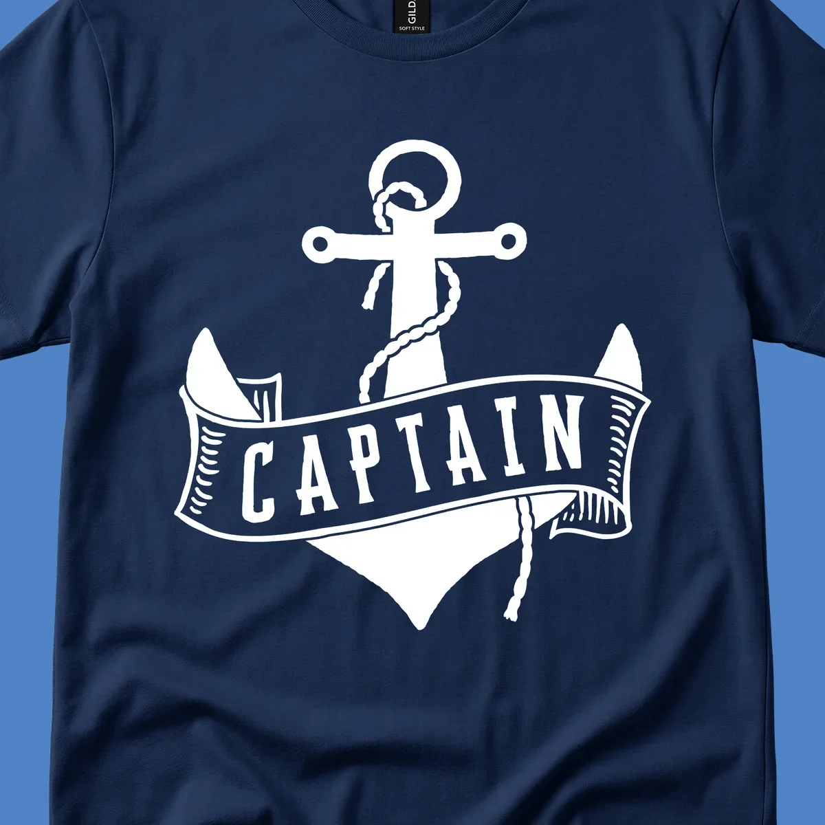 Vintage nautical captain anchor badge design with rope, cross emblem, sailing ship, and banner ribbon on gray background.