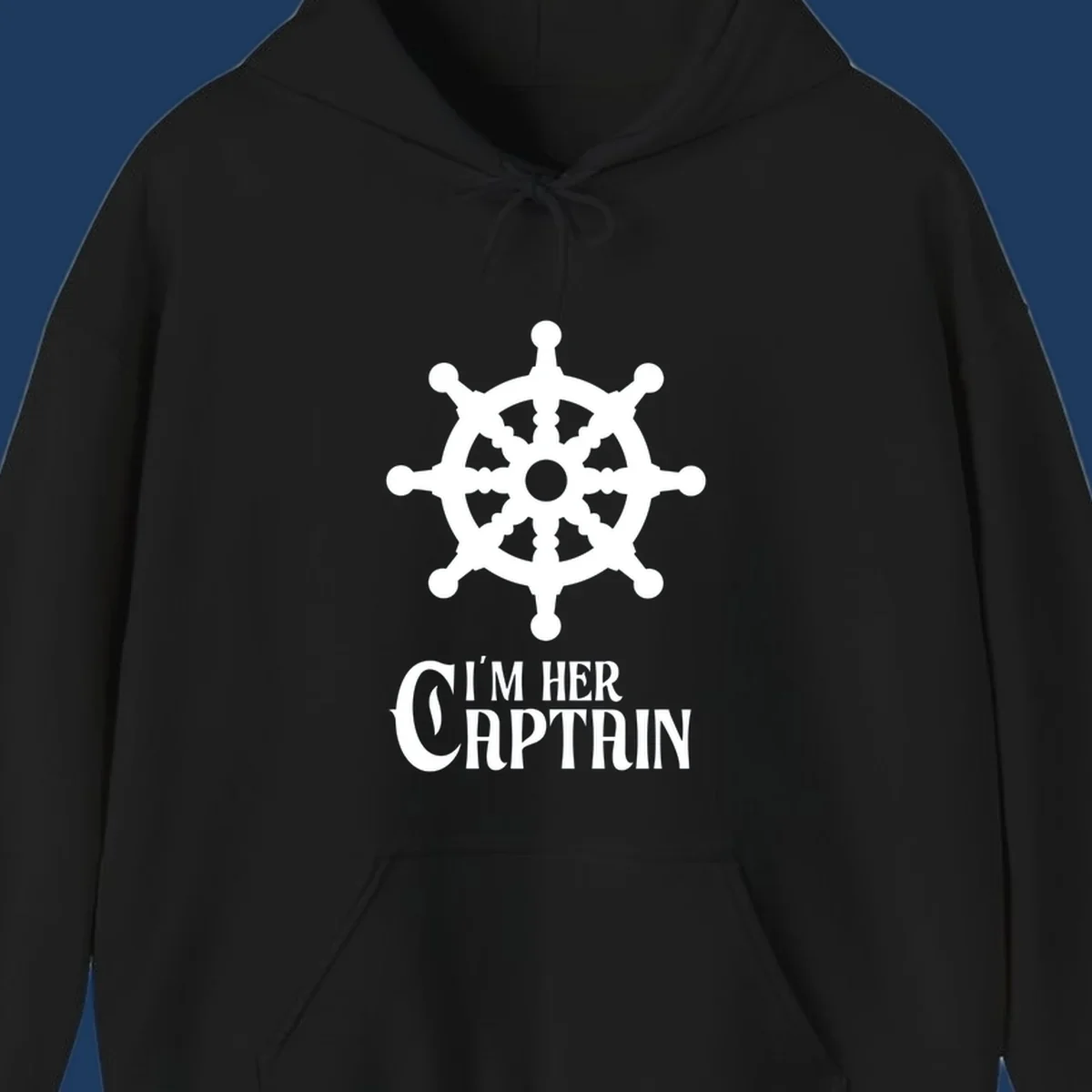 White ship's wheel with gray center above 'I'm Her Captain' text for cruise vacation apparel