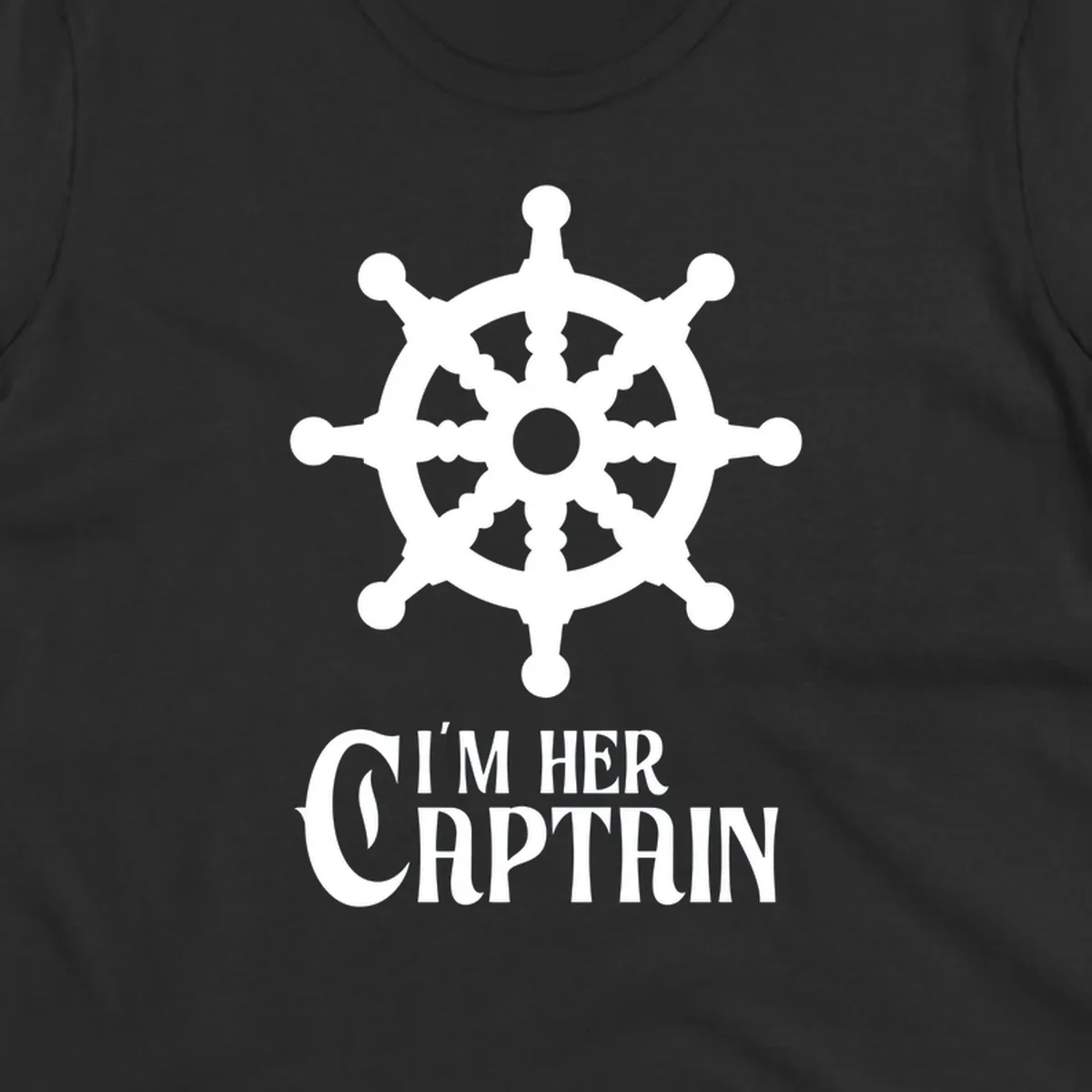 White ship's wheel with gray center above 'I'm Her Captain' text for cruise vacation apparel