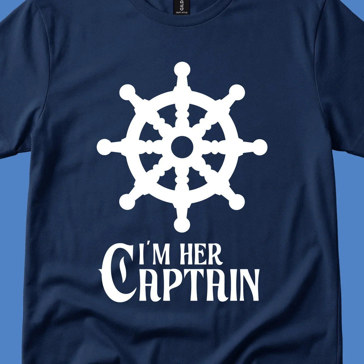 White ship's wheel with gray center above 'I'm Her Captain' text for cruise vacation apparel