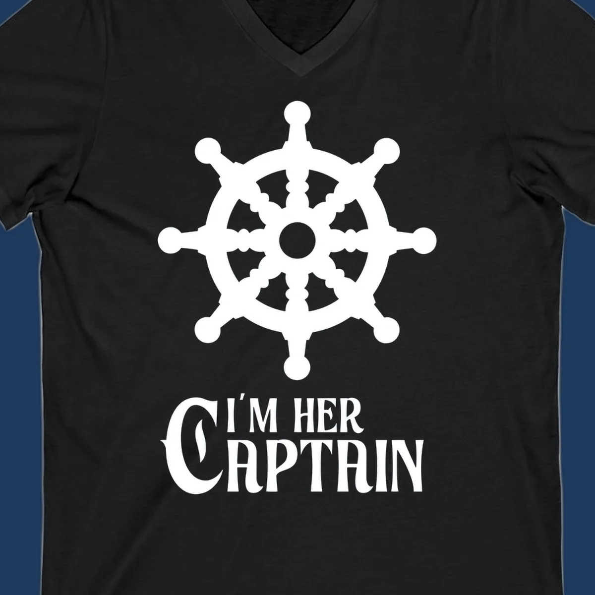 White ship's wheel with gray center above 'I'm Her Captain' text for cruise vacation apparel