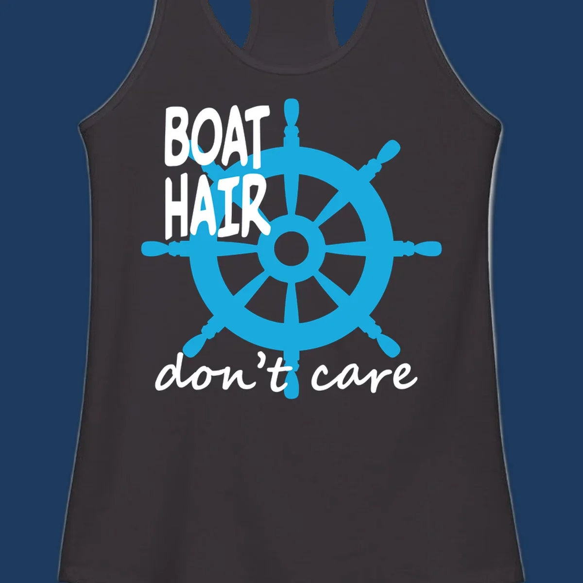 Blue ship's wheel graphic with white text reading 'BOAT HAIR don't care' - nautical cruise humor design