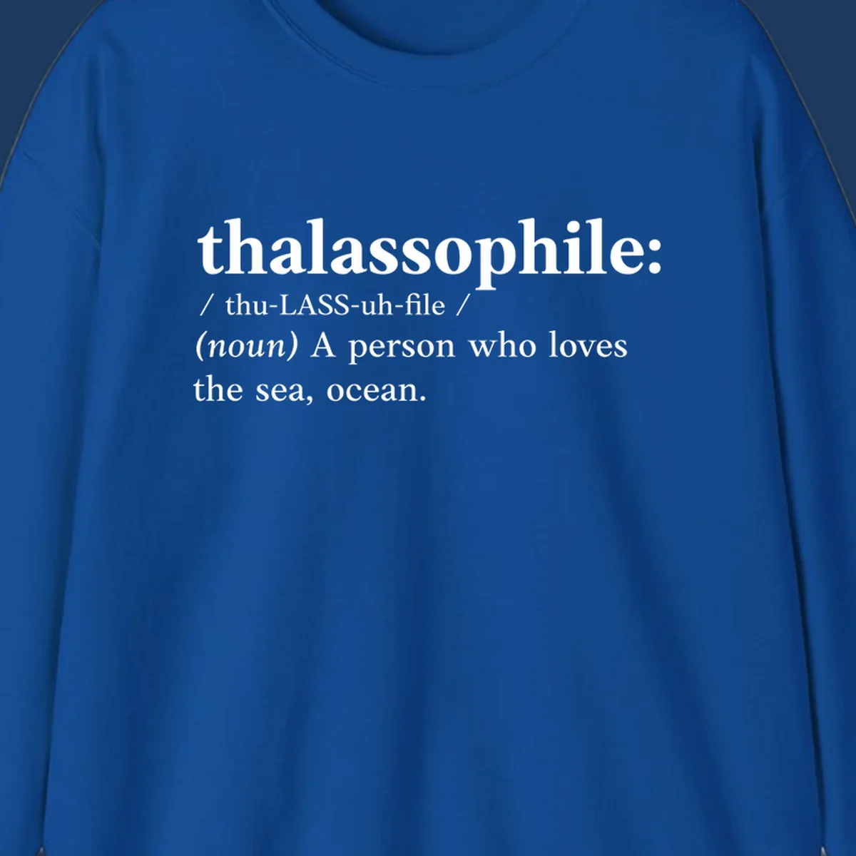 Dictionary-style definition of thalassophile, meaning a person who loves the sea and ocean, in white text on gray background