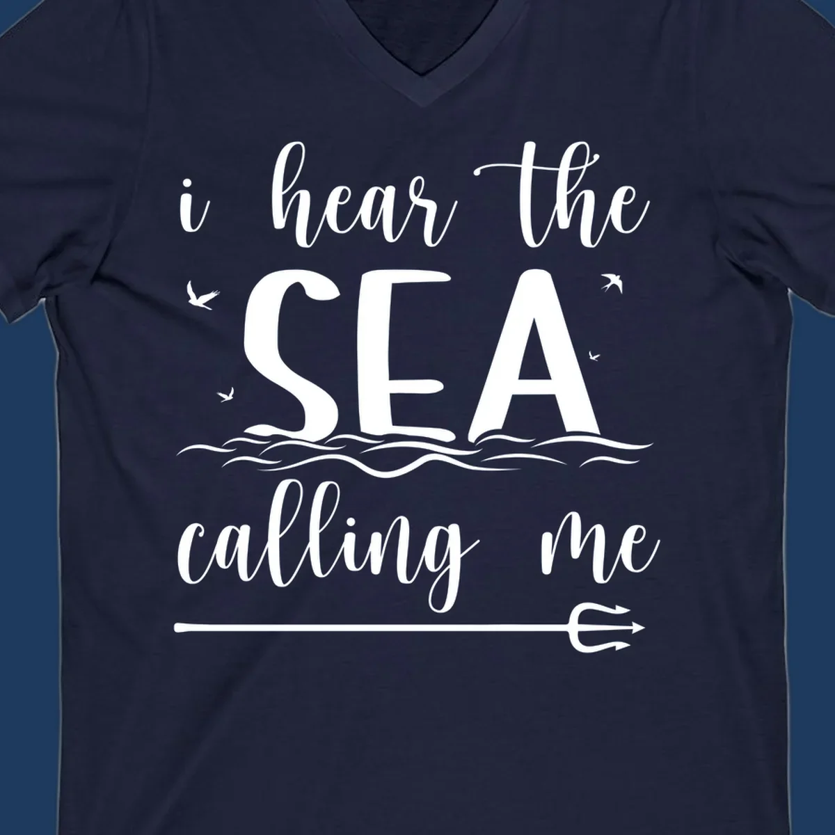 Sea-calling-cruise design with elegant script text 'I hear the sea calling me' surrounded by ocean waves, seagulls, and anchor illustration on gray background