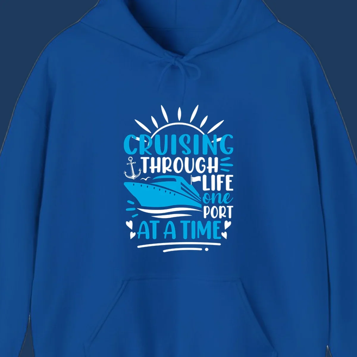 Blue cruise ship with sun rays and ocean waves, text reading 'Cruising Through Life One Port At A Time' with nautical anchor and heart decorations