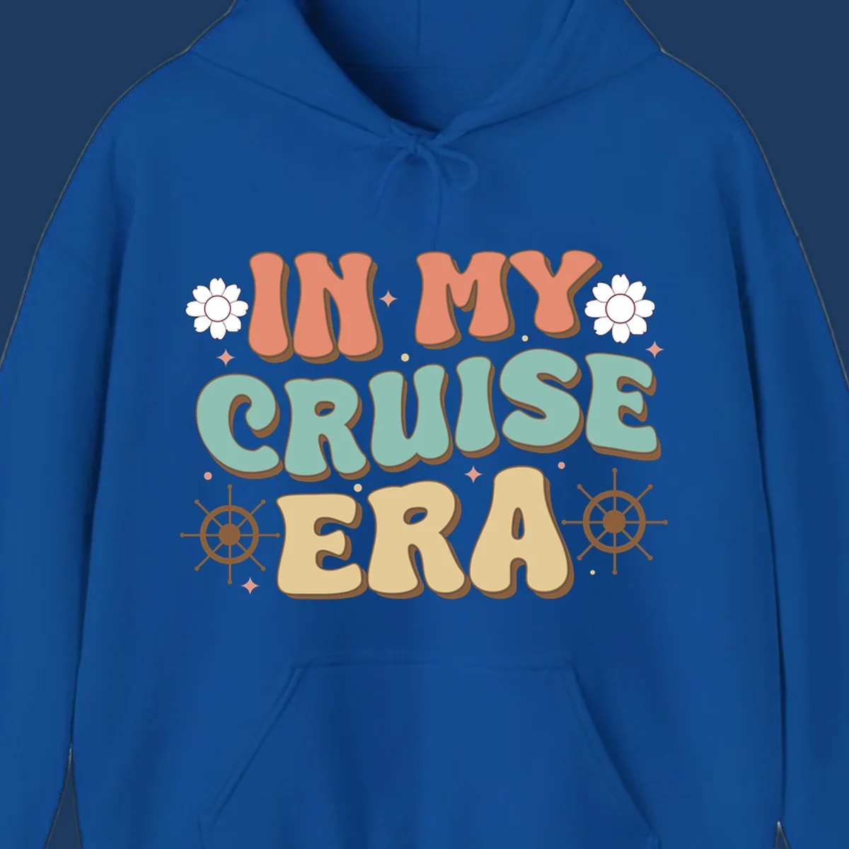 Retro-style design reading 'In My Cruise Era' with nautical ship wheels, daisies, and sparkles on gray background