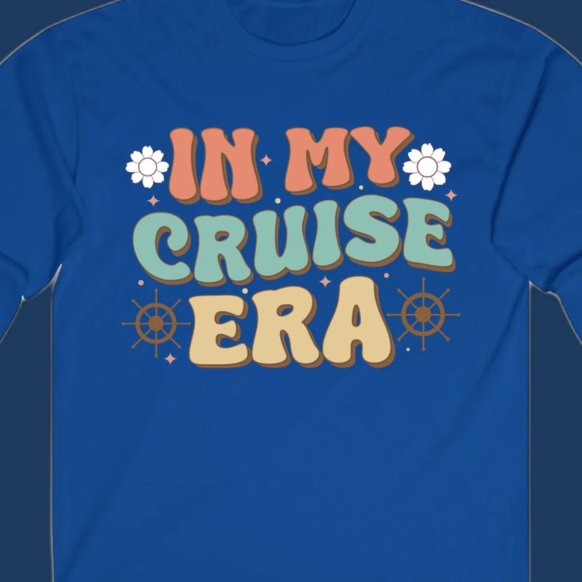 Retro-style design reading 'In My Cruise Era' with nautical ship wheels, daisies, and sparkles on gray background