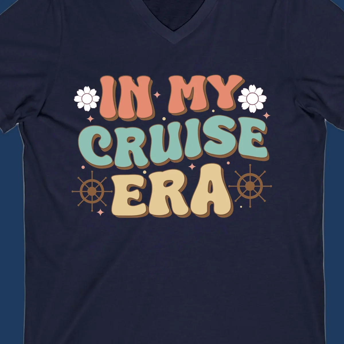 Retro-style design reading 'In My Cruise Era' with nautical ship wheels, daisies, and sparkles on gray background